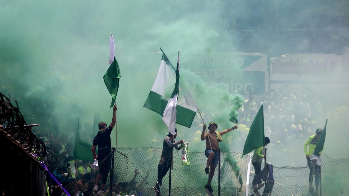Antigua is crowned twotime champion in the Guatemalan league final that ends in pitch invasion and a freeforall