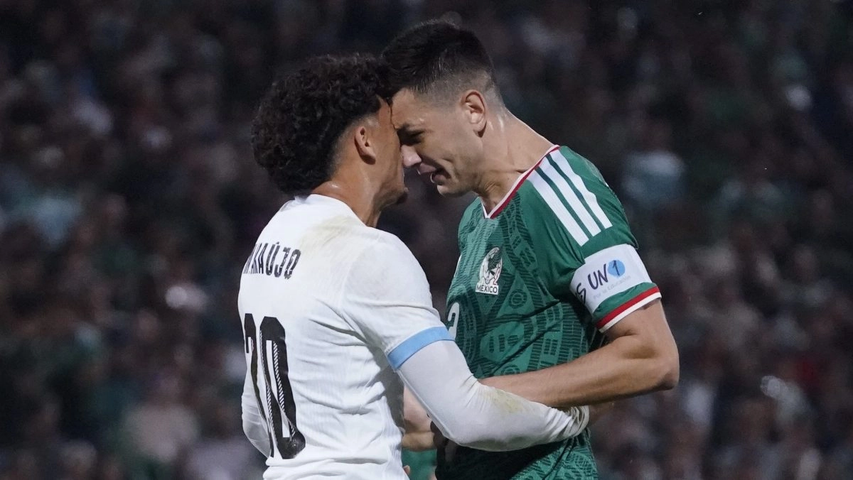 Cesar Montes and Maximiliano Araujo challenged each other with headbutts during a penalty play