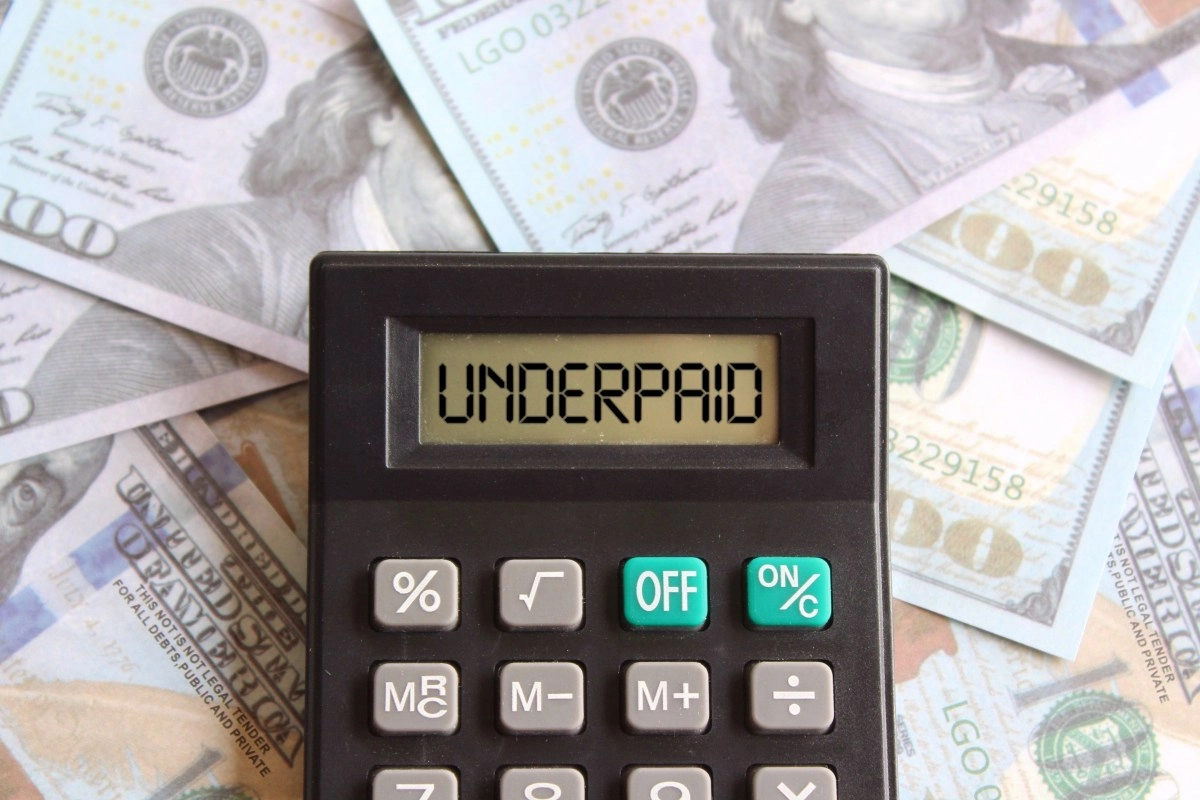 What to do if you are paid less for not having papers