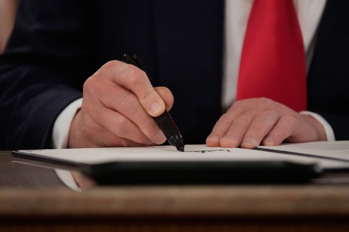 Donald Trump signs law ordering the release of Epstein files