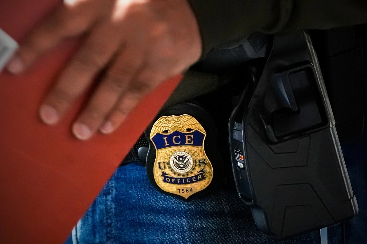 Asylum seeker detained by ICE alleges he was arrested despite not being the target of the operation