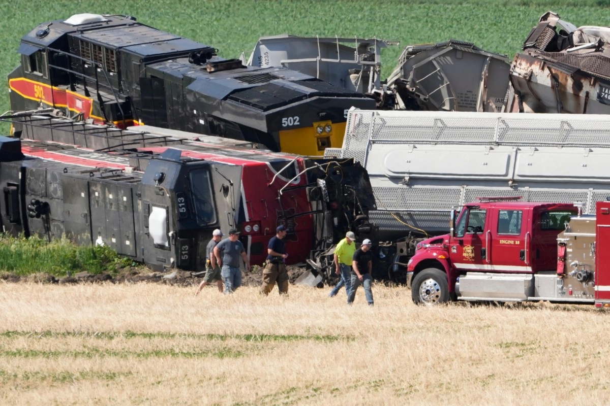 Freight train hits truck in Iowa one dead and one injured after massive derailment
