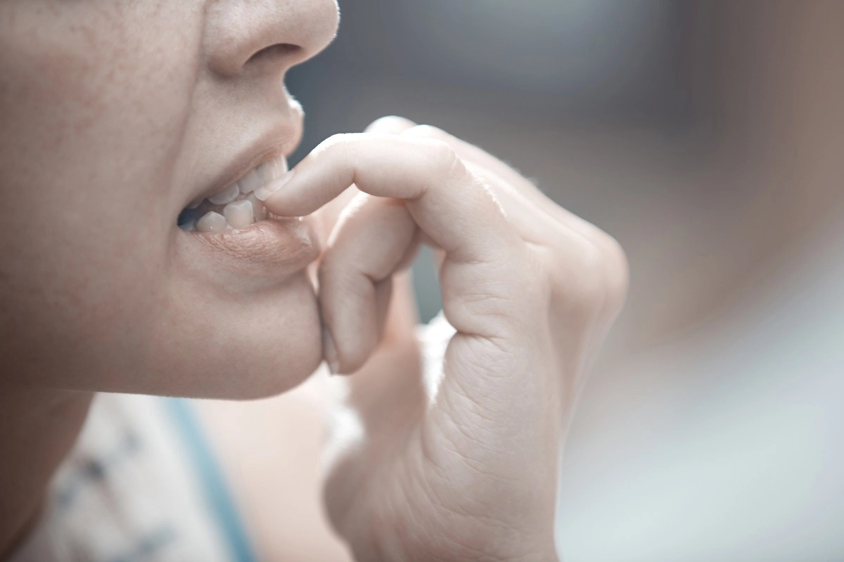 Do you bite your nails It has a hidden meaning and it039s not nerves