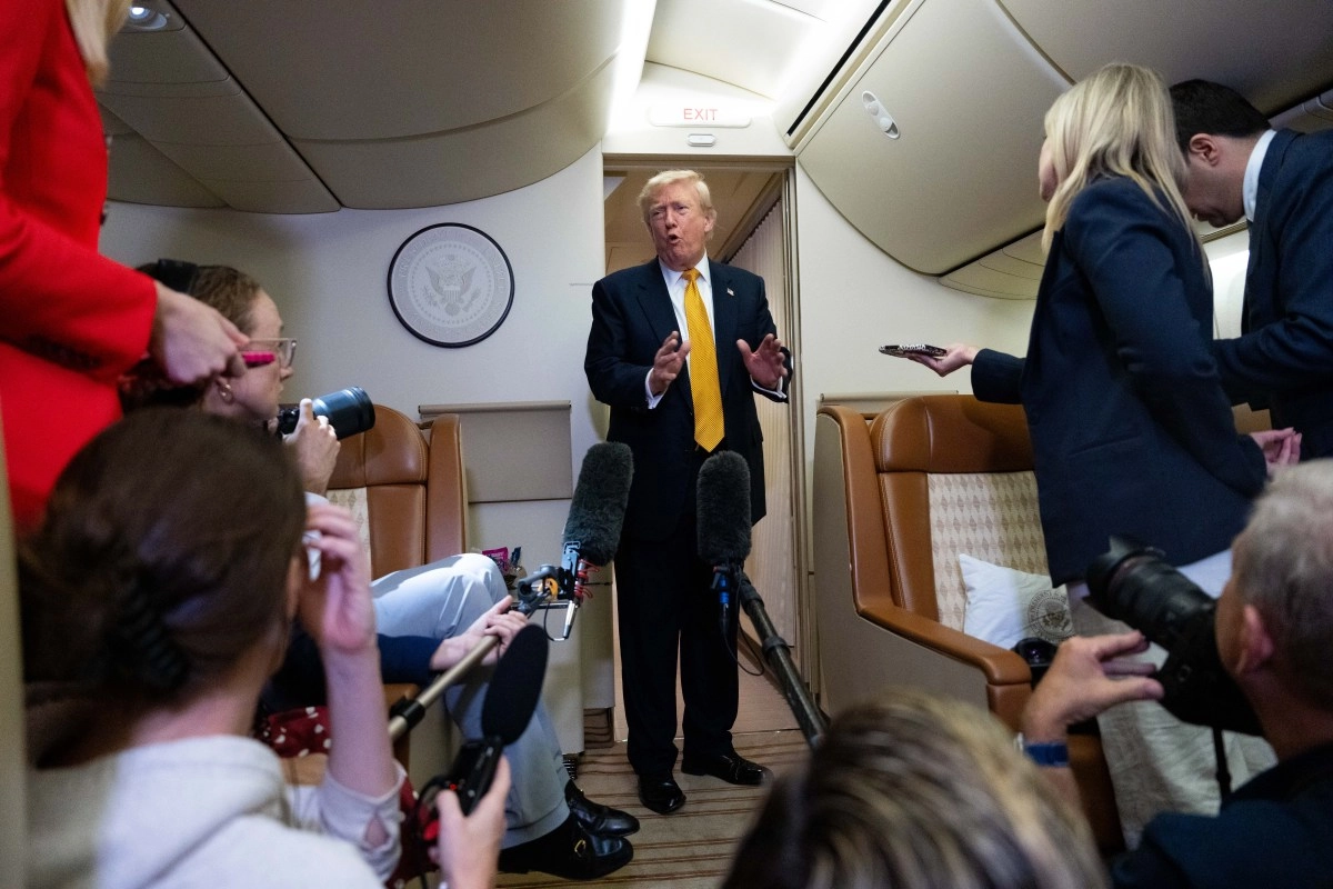 Trump issues threat to journalists aboard Air Force One amid tensions with Iran