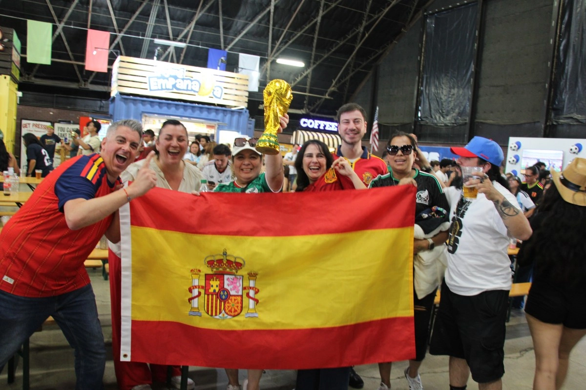 Spanish fans blow a kiss to the sky in Pomona for the World Cup title