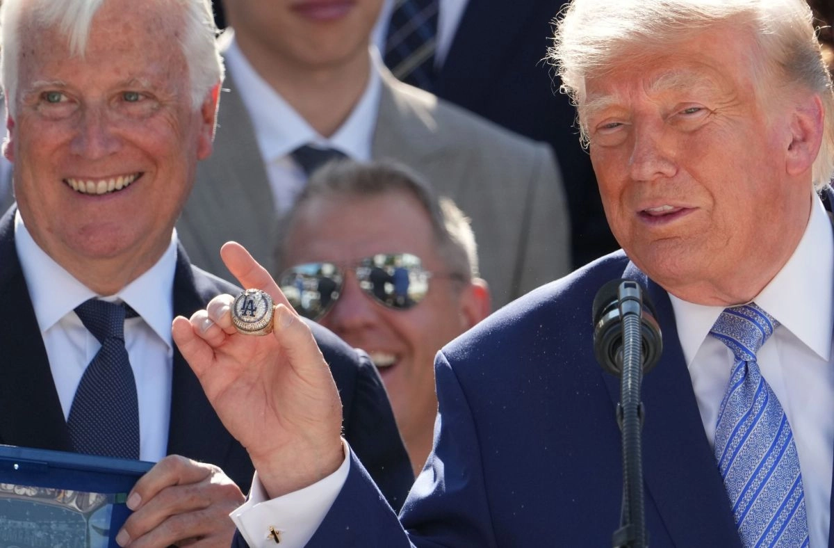 Trump receives a Dodgers ring and jokes Do I have to report this