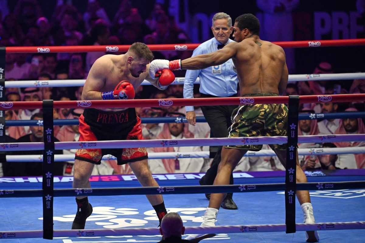 Anthony Joshua squeezed to knock out Kristian Prenga in two rounds