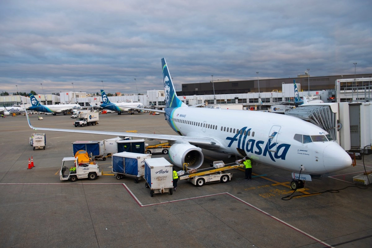 An Alaska Airlines flight was detained in Miami after passengers threatened to take control of the plane