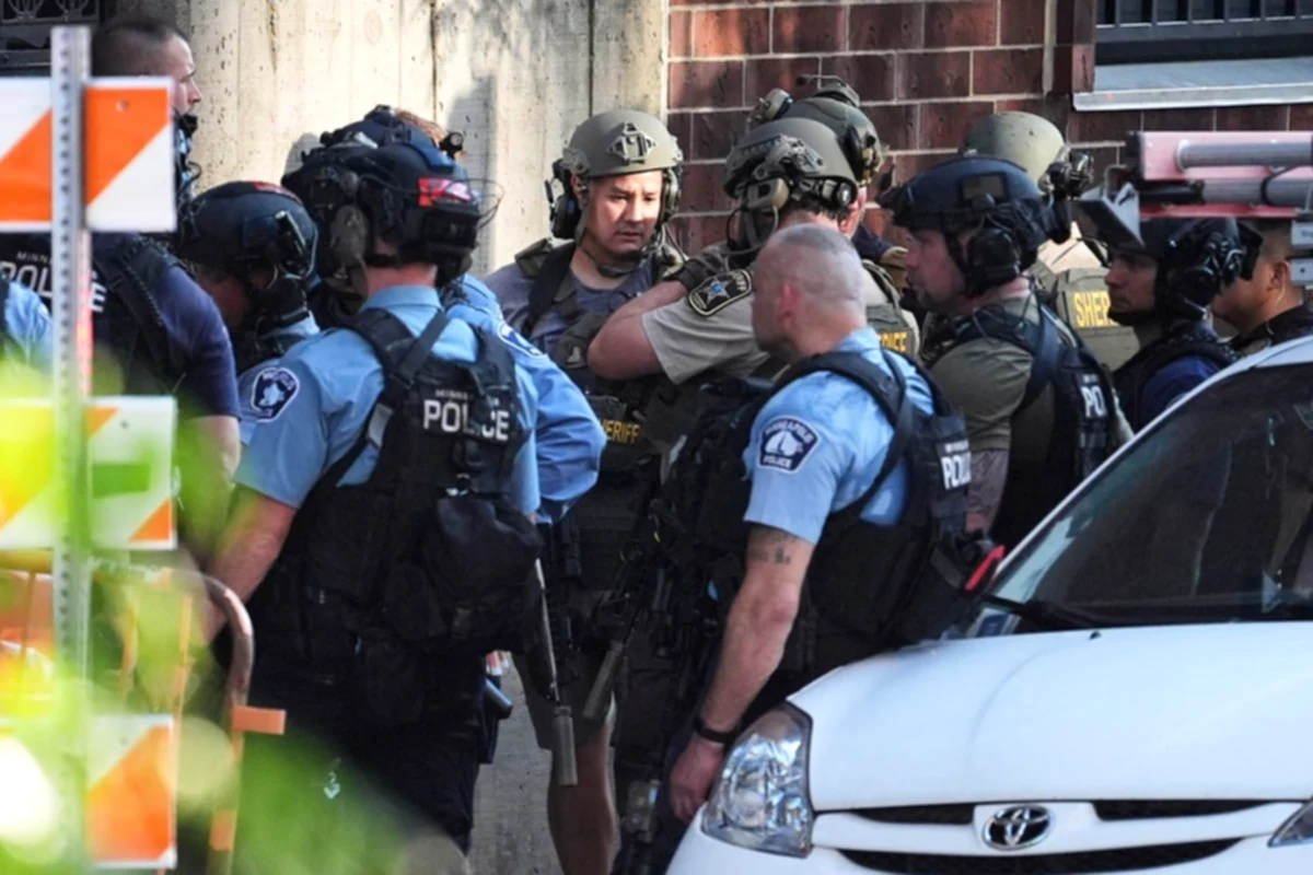 Shooting in apartment building kills three and wounds half a dozen in Minneapolis