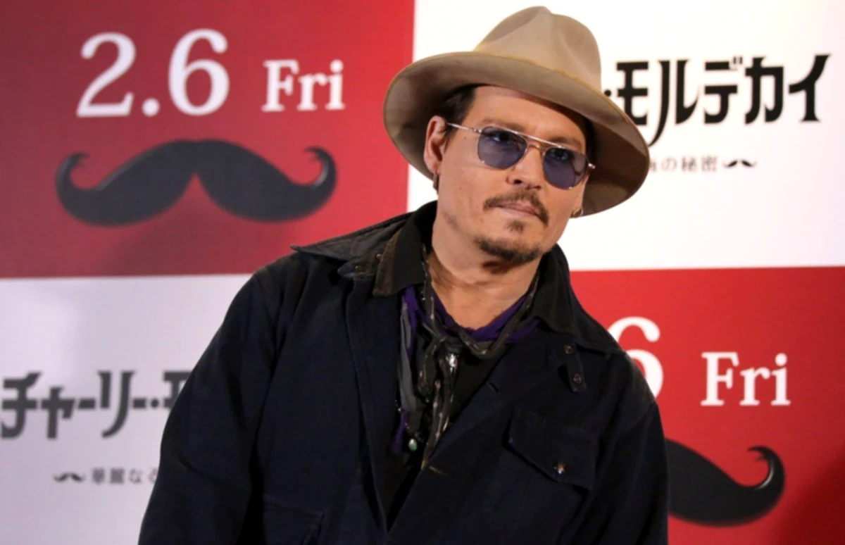 Johnny Depp plays “Ebenezer Scrooge” in his new film