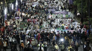 Families of missing people in Mexico challenge World Cup siege hours before the opening
