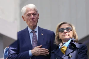 Bill Clinton is caught dozing at the inauguration of Barack Obama's public library