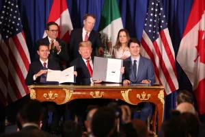 Although Trump now �hates� his own trade deal, he will find it difficult to undo it, analysts say