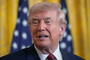 Donald Trump shares an image of the new $100 bill with his signature added
