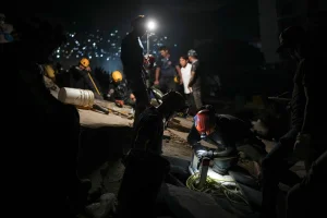 Los Angeles firefighters return after rescuing victims in Venezuela