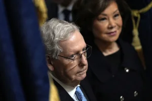 Mitch McConnell's wife Elaine Chao chose to remain in China while he remains hospitalized