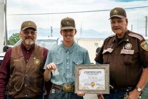 Young cowboy becomes a hero when he rescues a man in a Montana river with a lasso